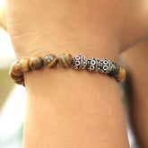 Tiger Eye Stretch Bracelet in Sterling Silver Three Bali Beads